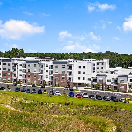 Noble on Newberry aerial view of property showing surrounding landscaping