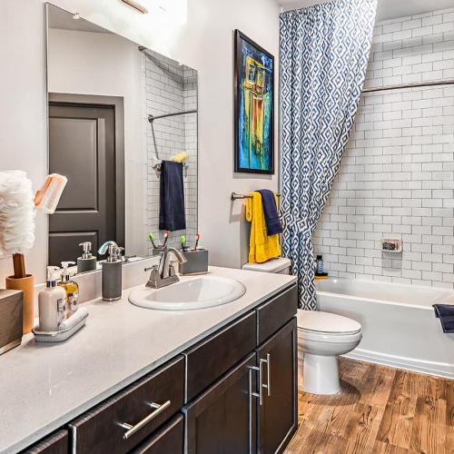 Bathroom bathroom with modern finishes, a closet and ample counter-space